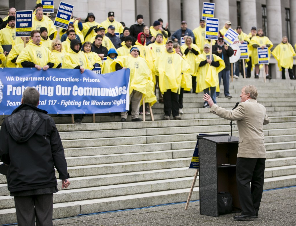 Representative Steve Tharinger speaks during the Department of Corrections Day of Action Rally on the capitol steps.