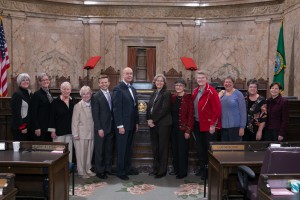 At the center of this photo, from left to right: Representatives Jamie Pedersen (D-Seattle), Jim Moeller (D-Vancouver) and Laurie Jinkins (D-Tacoma) with retired Judge Anne Levision, who officiated a number of same-sex marriages after lawmakers passed the bill and voters affirmed it at the ballot bot.
