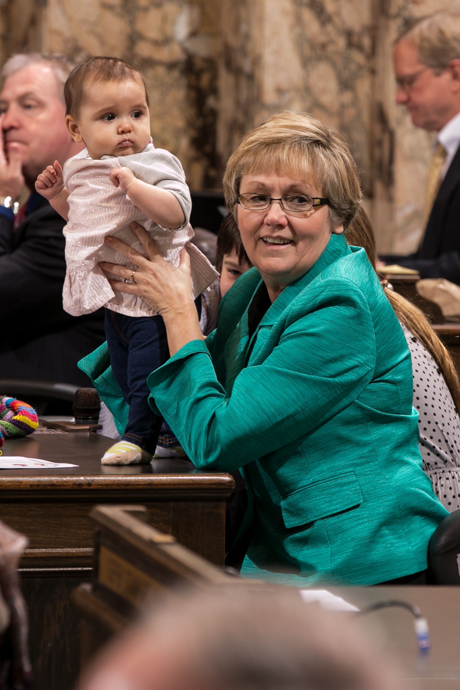 Rep Dawn Morrell with family during Children's Day on the House Floor.