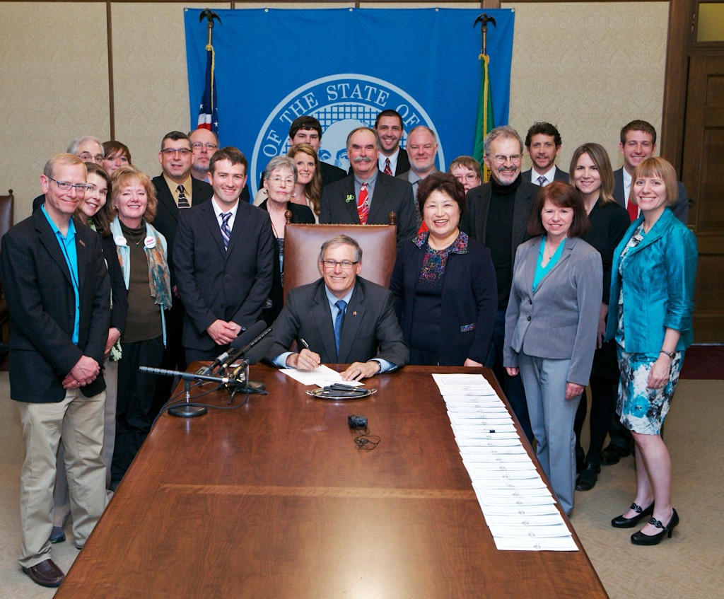Gov. Jay Inslee signs the Neighborhood Safe Streets Act (House Bill 1045) by Rep. Cindy Ryu (D-Shoreline).