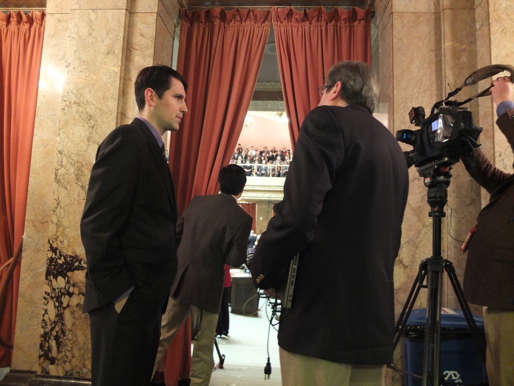  Rep. Steve Bergquist (D-Renton) being interviewed by KOMO TV reporter Keith Eldridge outside of the chamber of the House of Representatives.