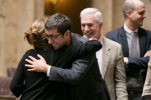 Rep. Brady Walkinshaw (Seattle) is congratulated for his first bill passing the house floor