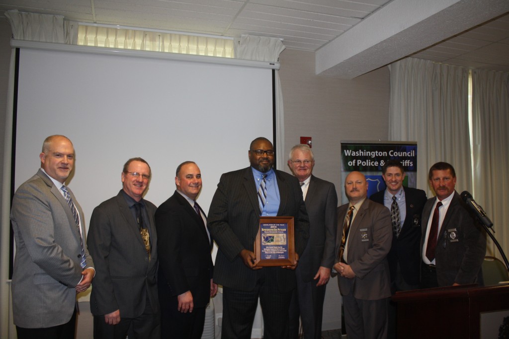  Rep. Pettigrew receiving the WACOPS Legislator of the Year Award