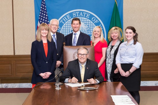 Governor Jay Inslee signs Substitute House Bill No. 2425, March 29, 2016. Relating to changing the words "massage practitioner" and "animal massage practitioner" to "massage therapist" and "animal massage therapist". Primary Sponsor: Rep. Patty Kuderer