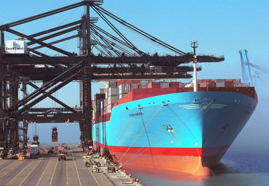 A Mearsk container ship loads and unloads at the same time at the Port of Tacoma docks. 20Oct99 by Dick Milligan