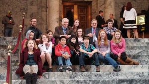 Boys and Girls Club members with Rep. Kevin Van De Wege inside the state capitol.