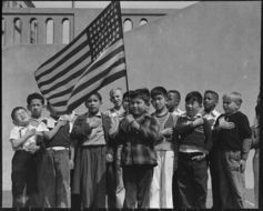 Photo of kids with US flag