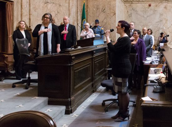 Lakewood resident Crystal Wolf singing national anthem at opening ceremonies House of Representatives