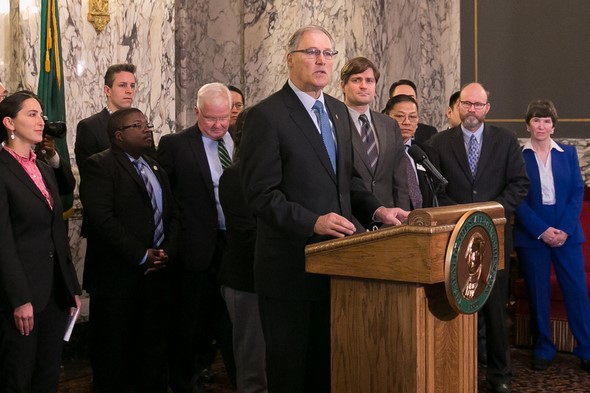 Governor Inslee with members of the Legislature Mike Pellicciotti Zack Hudgins Laurie Dolan speaking about access to Democracy