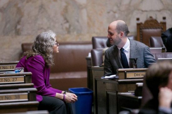 Reps. Laurie Jinkins and Drew Hansen on House floor