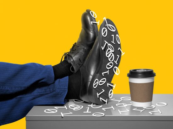 Shoes propped up on a desk covered in numbers representing data.