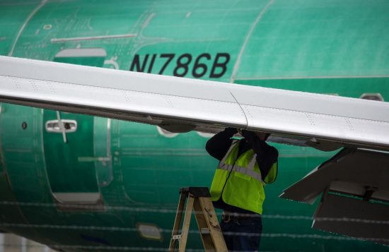Man works on Boeing Max 737