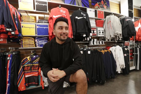 Victor Duran, 23, a co-manager of a sports apparel store at the Southcenter mall in Tukwila