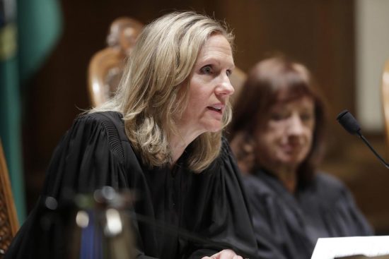 New Washington Supreme Court Chief Justice Debra Stephens speaks from the bench.
