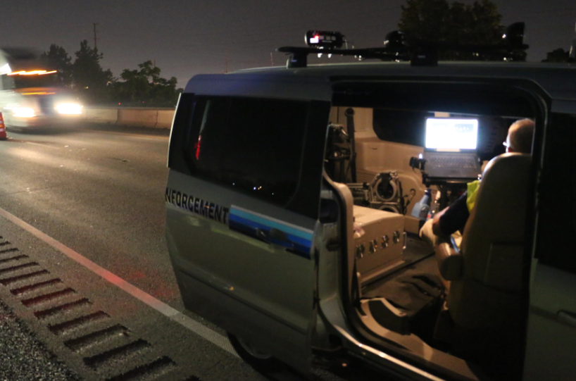An officer works in a speed enforcement van along I-5 in Medford during construction in 2018. The effort to slow drivers nabbed one driver going 91 mph in the 40 mph work zone.