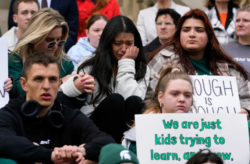 Current and former Michigan State University students rally and mourn victims of a campus shooting on Monday at the state capitol in Lansing, Michigan, on Wednesday, Feb. 15, 2023