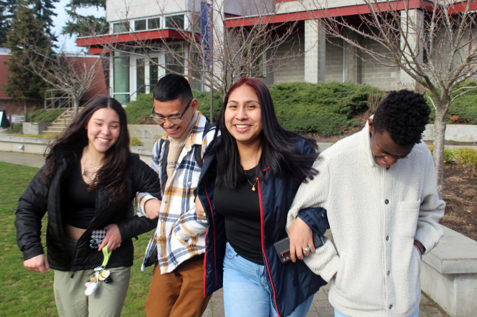 From left, Keiley Pyeatt, Philip Palpita, Margarita Sanchez, and Branton Waitiki (all age 17), students in Tacoma Community College's Running Start program, in front of the student center.