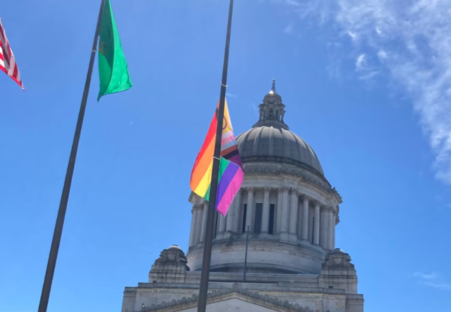 A new, more inclusive Pride flag debuts at the Washington Capitol in Olympia on Tuesday, June 21, 2022.