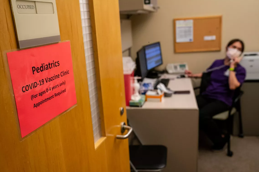 A nurse works inside the pediatric COVID-19 vaccine clinic at UW Medical Center - Roosevelt on June 21, 2022, in Seattle, Washington.