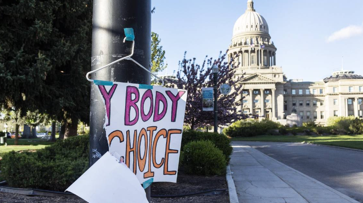 A sign reading “My body my choice” is taped to a hanger taped to a streetlight in front of the Idaho State Capitol Building on May 3, 2022. People gathered in downtown Boise at both City Hall and the Statehouse to protest the news of the Supreme Court draft leak indicating that Roe vs. Wade and Planned Parenthood v. Casey will be overturned