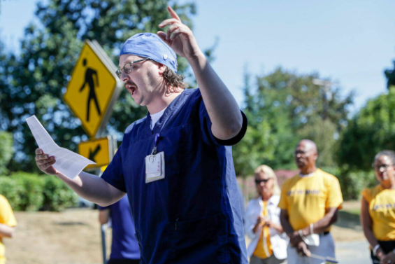 Trevor Gjendem addresses a gathering a hospital staff members, supporters and elected officials on August 24, 2022 in Everett, Washington.