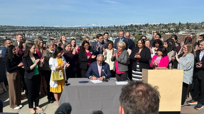 Gov. Jay Inslee signed five reproductive and gender-affirming healthcare bills into law at the University of Washington on Thursday April 27, 2023. The bills will offer more protection for those in the state who seek reproductive and gender-affirming healthcare
