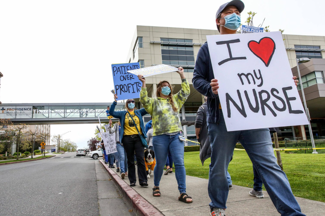 Supporters of nurses march across from Providence Medical Center on May 5, 2021 in in Everett, Washington.