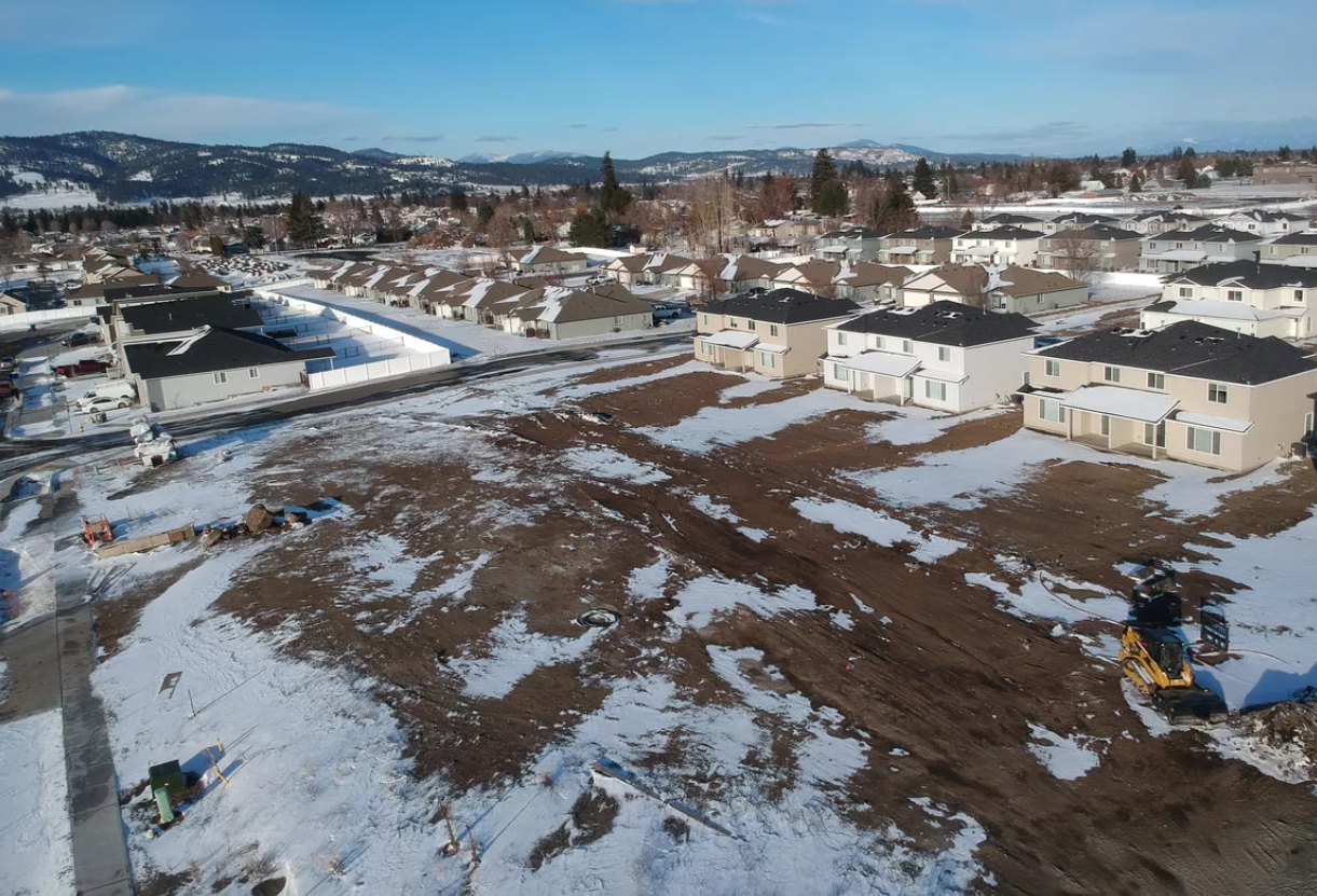 Open land in Spokane Valley, including this new neighborhood of mostly duplexes, is being filled with homes to try and fill the need for housing in the Spokane area.