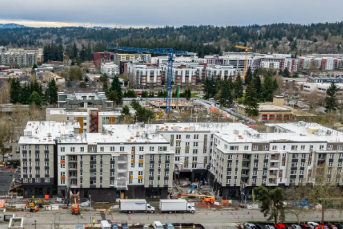 Together Center in Redmond is a first of its kind human services hub blended with 280 units of affordable housing. Of these, 200 workforce units will house families earning 60% or less of AMI, and 80 units will house families earning 30%-50% AMI, with 75% of these deeply affordable units set aside for families exiting homelessness.