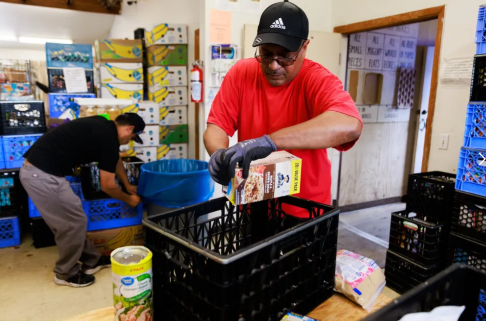 olunteer Damon Daniel works at the Auburn Food Bank Daniel says he spreads the word to people about the food bank, including individuals who are homeless. “I like to help out,” he says