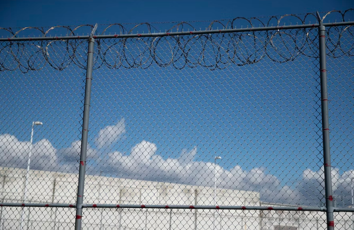 A fence outside of the Northwest Detention Center, recently renamed the Northwest ICE Processing Center, is shown on Tuesday, September 10, 2019, in Tacoma.