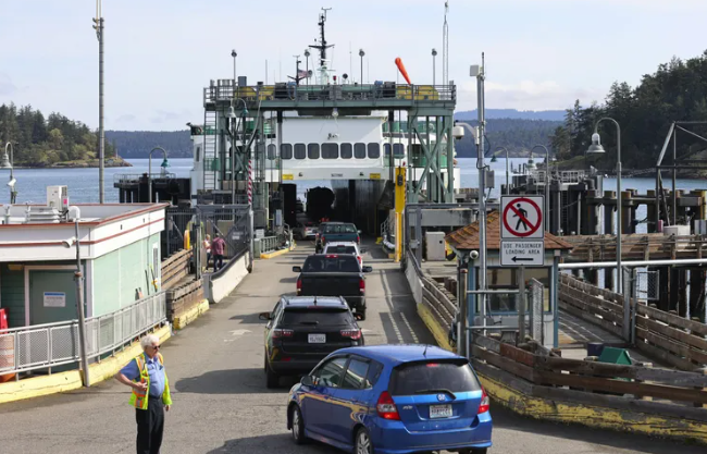 Cars load onto a Washington state ferry in May at the ferry terminal in Friday Harbor on San Juan Island.