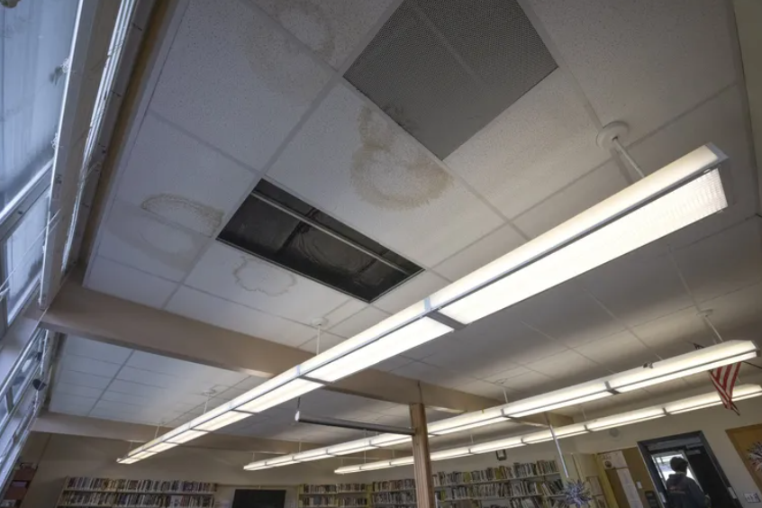 Leaks have stained and left a hole in the ceiling of the library at Wahkiakum High School.
