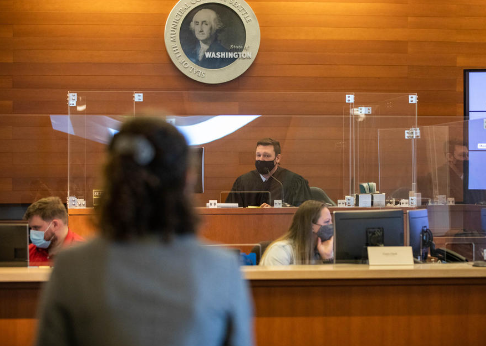 Judge Seth Niesen presides over Seattle Community Court at the Municipal Court of Seattle in this August 2022 file photo. Seattle City Attorney Ann Davidson has since ended the city’s participation in the Community Court program.