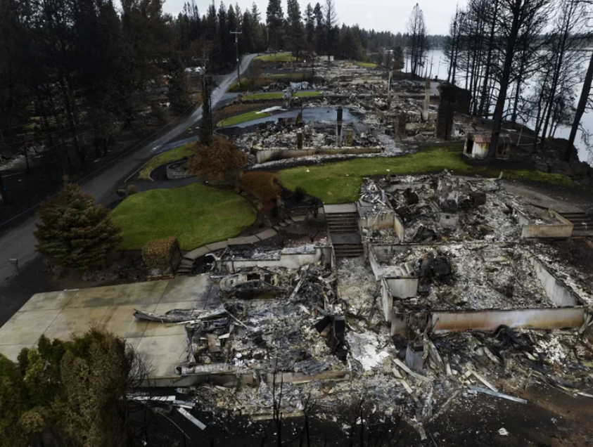 Homes were razed by the Gray fire on the western shore of Silver Lake on Aug. 31, 2023.