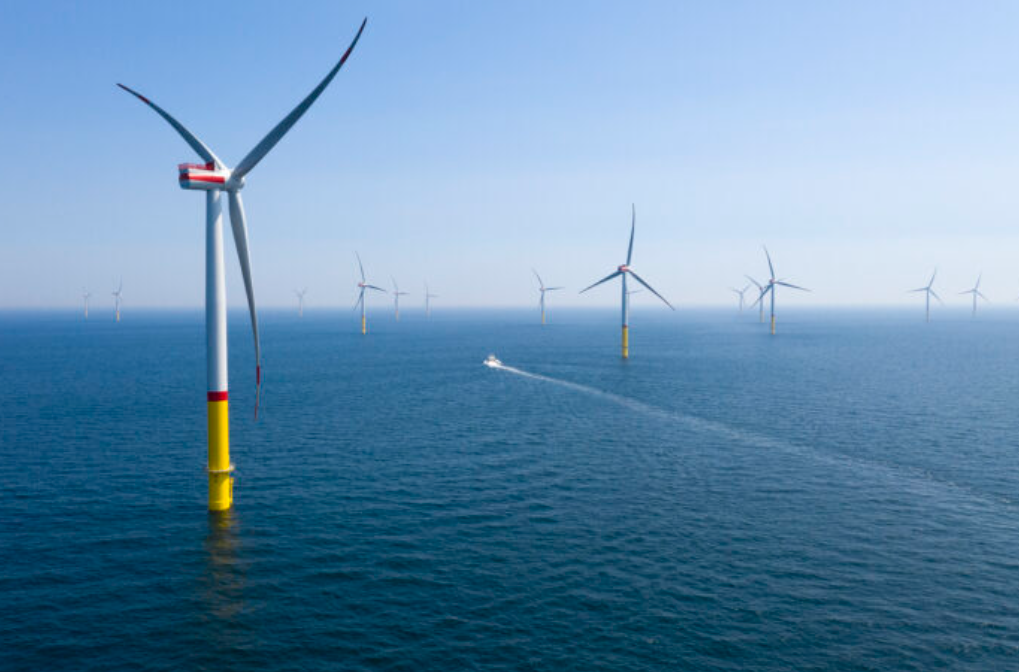  In this aerial view wind turbines spin at the recently-inaugurated Arkona wind park in the Baltic Sea on June 5, 2019 off the coast of Sassnitz, Germany. The Arkona wind park, operated by E.ON, consists of 60 wind turbines that generate a total of 385 MW of electricity.