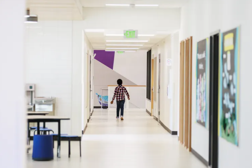 Enrollment has plunged by 1,100 more students in Seattle schools, and test scores for many kids in need are not bouncing back. Where is the civic rally to save the schools? Here, a student walks down the hall on the first day at the newly remodeled West Seattle Elementary on Sept. 6.