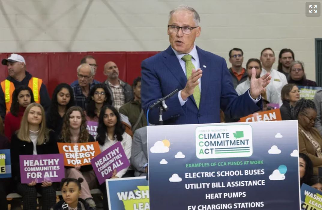 Washington State Governor Jay Inslee rolls out his budget proposal including climate change at a news conference on Monday at Miller Community Center in Seattle