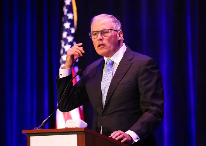 Gov. Jay Inslee, shown here speaking at a fundraiser in Seattle on Dec. 5, is seeking $2.5 billion more in overall spending,