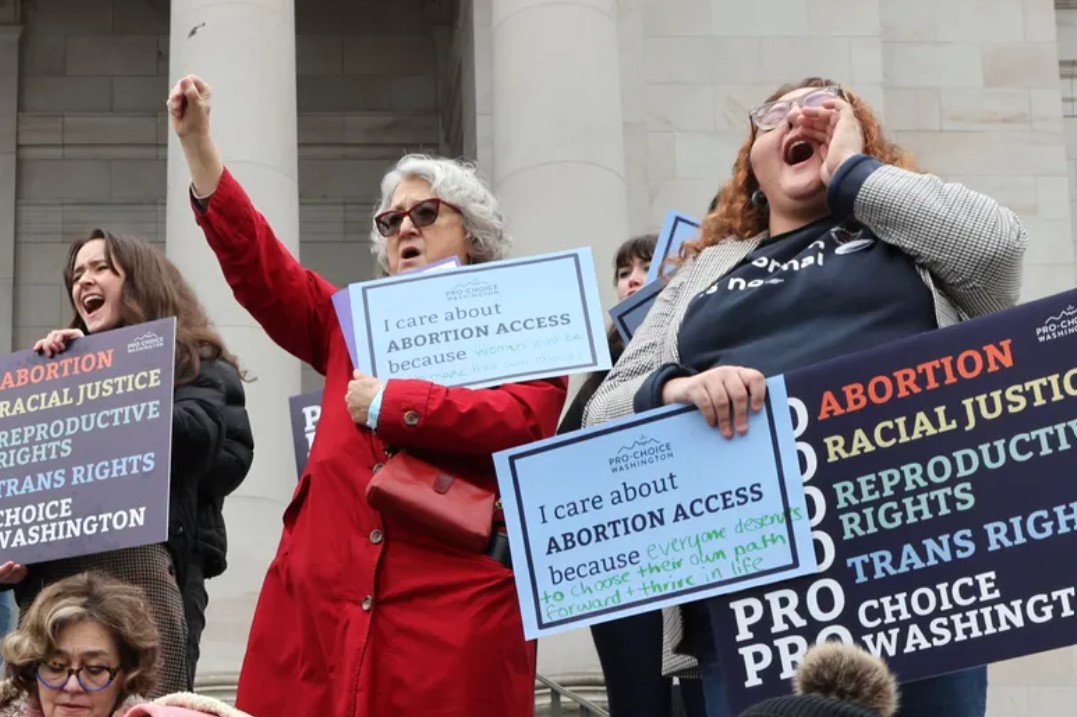 People cheer during an abortion rights rally at the state Capitol in Olympia on Jan. 24.
