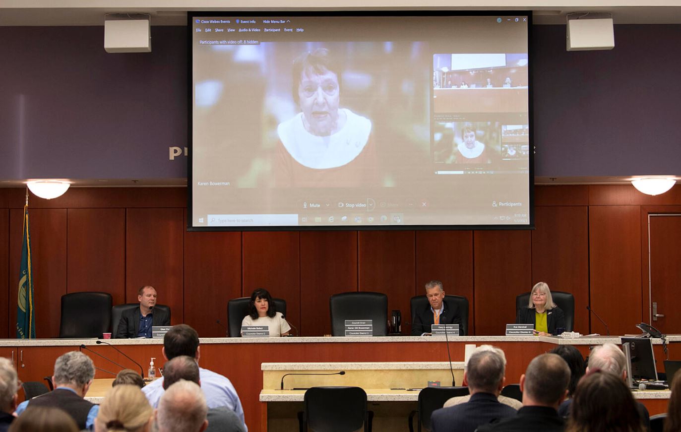 Members of the Clark County Council are pictured after new councilors took the oath of office at the Clark County Public Service Center on Jan. 3, 2023. Councilors are Glen Yung, from left, Michelle Belkot, Karen Bowerman, on screen, Gary Medvigy and Sue Marshall.