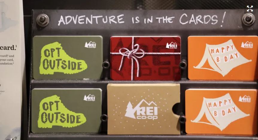 Gift cards are displayed at REI’s flagship store in Seattle