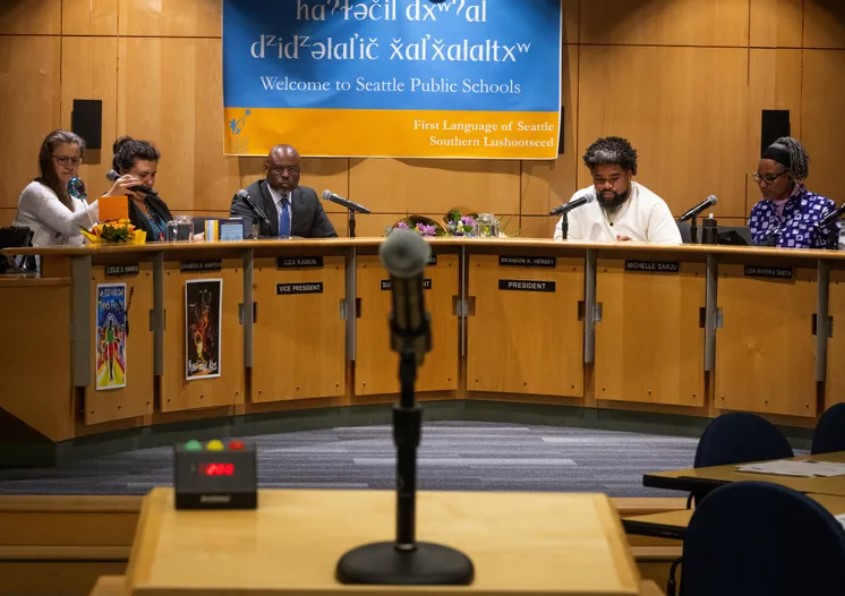 A podium with a microphone sits at a Seattle School Board meeting on Nov. 15