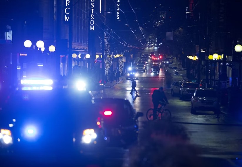 Patrol cars and ambulances are shown at the intersection of Third Avenue and Pine Street on Wednesday, Jan. 22, 2020.