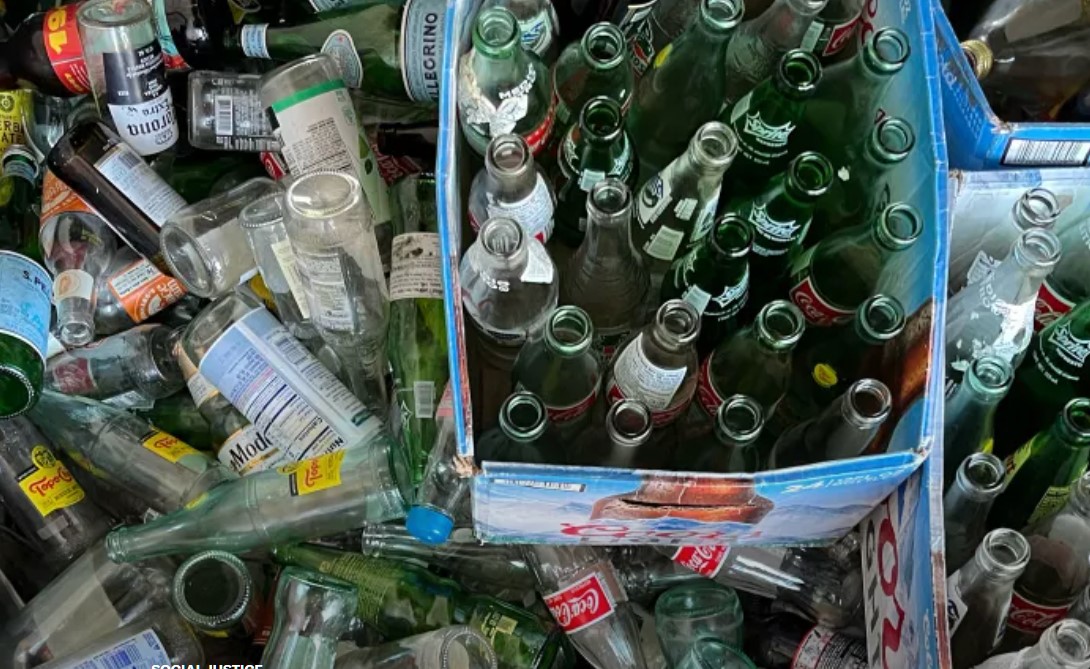 Glass bottles are gathered at the People's Depot in Portland, Oregon, a beverage container redemption center, before they are collected by the Oregon Beverage Recycling Cooperative.