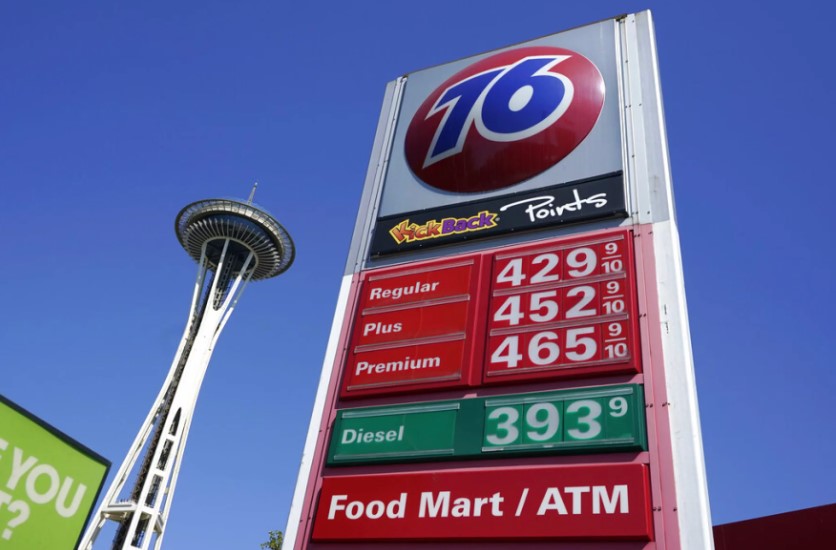 Gas prices are shown at a station, Thursday, Sept. 2, 2021, near the Space Needle in Seattle.