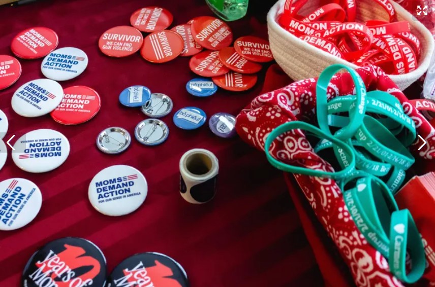 Buttons, bracelets and stickers were given out to volunteers and members who attended the Moms Demand Action legislative lobby day for gun safety on Thursday in Olympia.