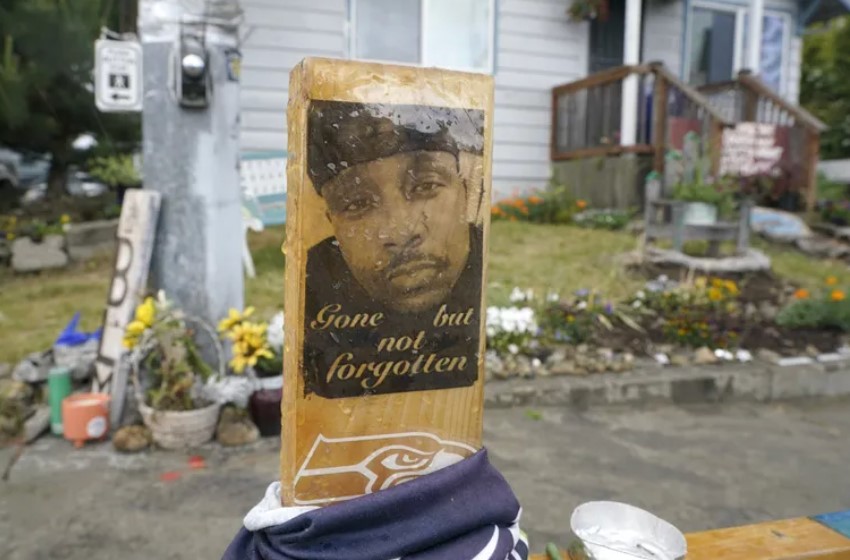 A memorial for Manuel “Manny” Ellis at the intersection in Tacoma where he died on March 3, 2020, after being restrained by Tacoma police officers.