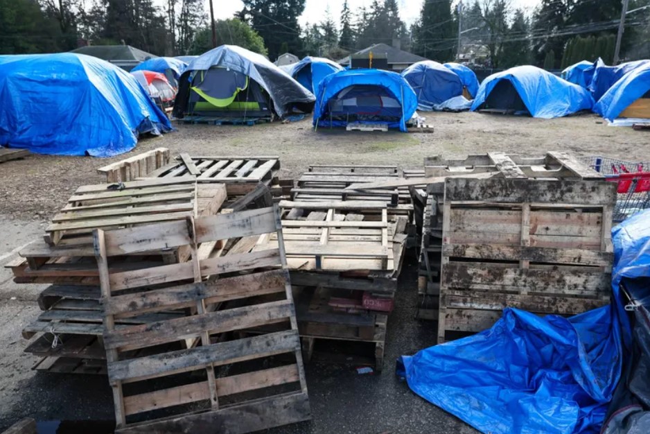 Asylum-seekers were staying in tents at the Riverton Park United Methodist Church in Tukwila on Feb. 13. 