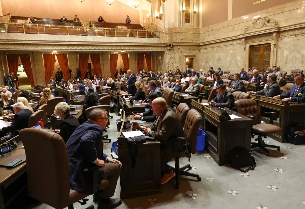 Lawmakers in the House of Representatives meet in Olympia for a special session in Olympia last year, when the Legislature first allocated funding to help undocumented immigrants with the cost of private health insurance.